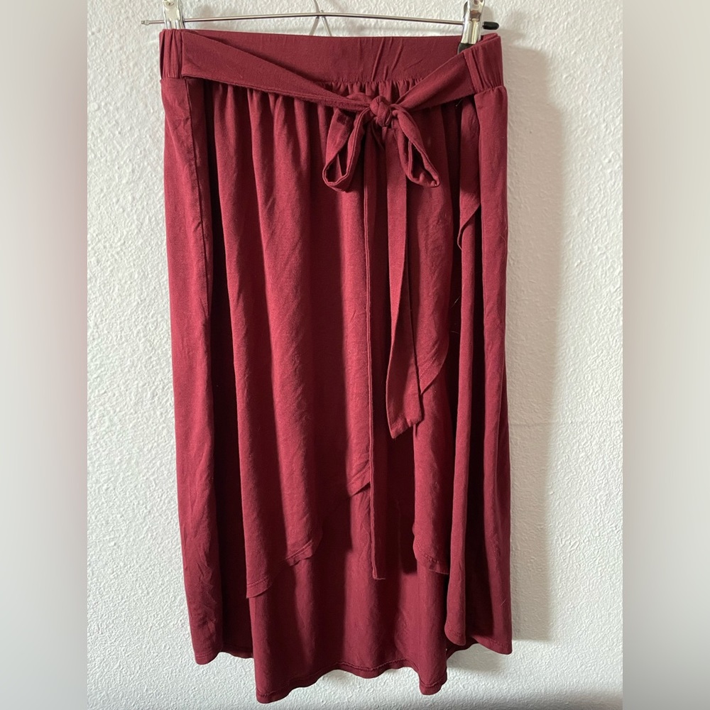 Stretchy wrap-style skirt with hi-low short. Comfy fabric, very pretty.